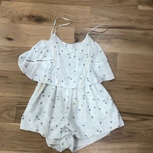 Bcbg romper. White and blue. Cut out in the back